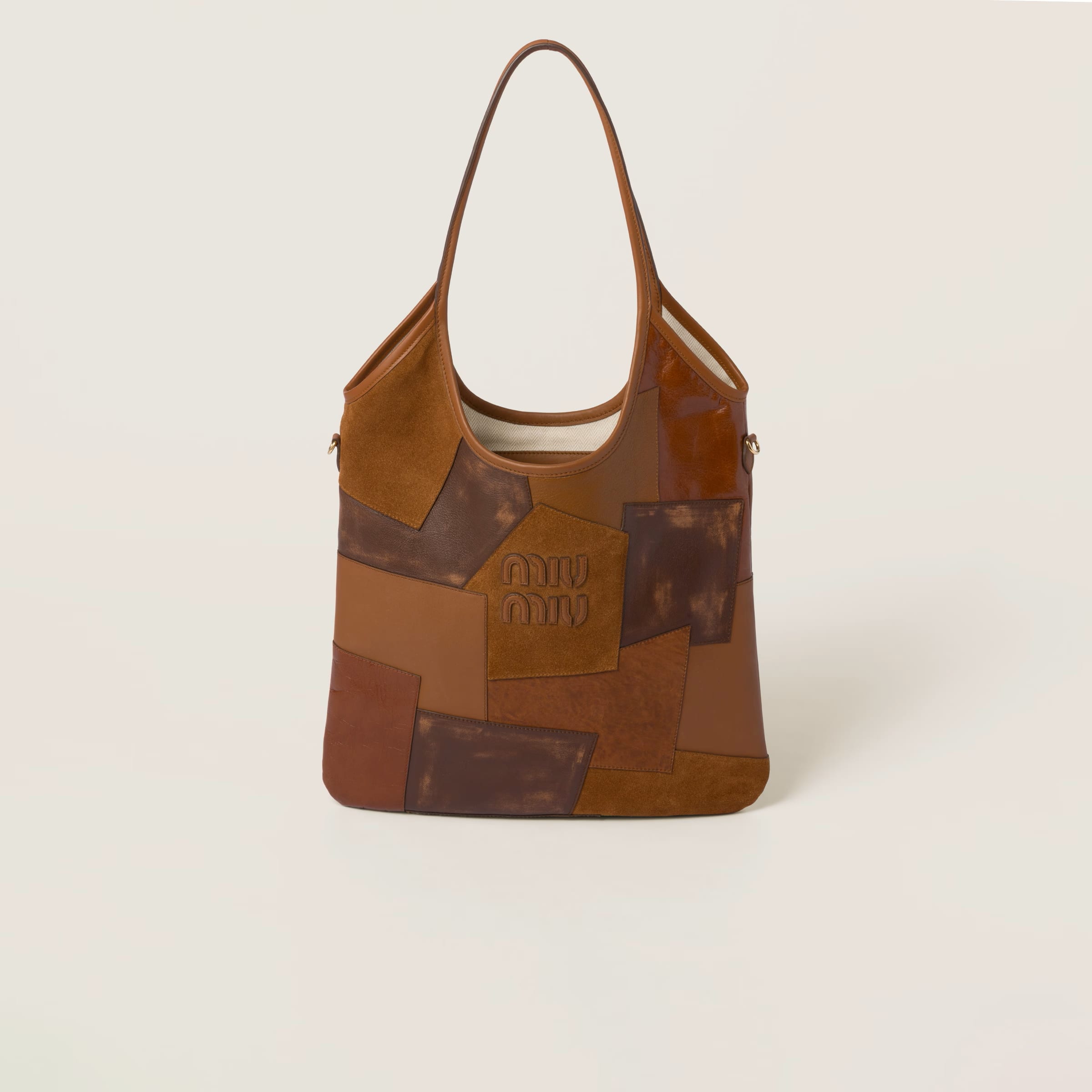IVY leather patchwork bag in Cognac, SGD 4350 (approximately P191,869.97), MIU MIU, miumiu.com